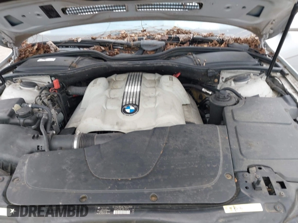 2005 BMW 7 Series 745Li with VIN WBAGN63545DS59047, listed as a IAAI auction lot 41802442 with Not Provided miles and . Bid and sale history available at carsss.com. Image 10.