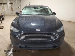 2020 Ford Fusion SE с VIN 3FA6P0HD7LR146595, выставлен на аукционе Copart как лот 61006345 с пробегом 128 741 миль миль и Чистый • Clean title. История ставок и продаж доступна на DreamBid. Изображение 5.