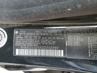 2003 BMW 7 Series 745i with VIN WBAGL63483DP65989, listed as a Copart auction lot 82057064 with 60,735 mi miles and Salvage title. Bid and sale history available at DreamBid. Image 13.