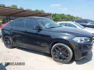 2018 BMW X6 xDrive50i with VIN 5UXKU6C58J0W39038, listed as a IAAI auction lot 40025654 with 106,080 mi miles. Bid and sale history available at carsss.com. Image 13.