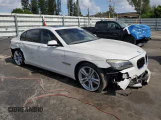 2012 BMW 7 Series 750Li z VIN WBAKB8C50CC964123, wystawiony jako Copart lot #60212005 z przebiegiem 75 979 mil mil oraz Szkoda całkowita • Salvage title. Historia ofert i sprzedaży dostępna na DreamBid. Obrazek 4.