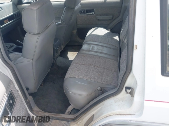1992 Jeep Cherokee with VIN 1J4FJ58S0NL102716, listed as a IAAI auction lot 42169406 with 197,167 mi miles and . Bid and sale history available at DreamBid. Image 8.