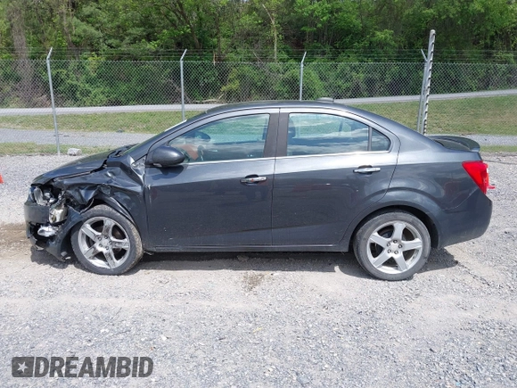 2016 Chevrolet Sonic LTZ z VIN 1G1JE5SB5G4137710, wystawiony jako IAAI lot #42131625 z przebiegiem 152 941 mil mil oraz . Historia ofert i sprzedaży dostępna na DreamBid. Obrazek 14.