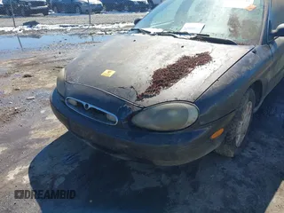 1997 Mercury Sable GS with VIN 1MELM50U7VA656293, listed as a IAAI auction lot 41651281 with 136,024 mi miles and . Bid and sale history available at DreamBid. Image 6.