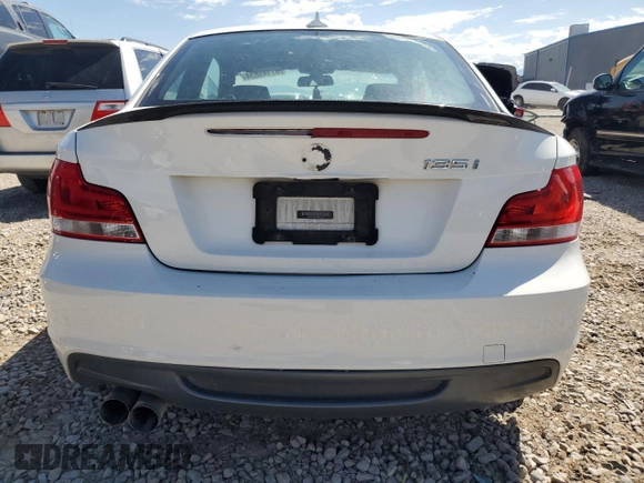 2012 BMW 1 Series 135i with VIN WBAUC9C52CVM12915, listed as a Copart auction lot 67145834 with 114,306 mi miles and Salvage title. Bid and sale history available at DreamBid. Image 6.
