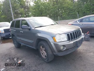 2007 Jeep Grand Cherokee Laredo z VIN 1J8GR48K47C656348, wystawiony jako IAAI lot #42263581 z przebiegiem 229 337 mil mil oraz . Historia ofert i sprzedaży dostępna na DreamBid. Obrazek 1.