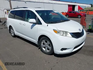 2013 Toyota Sienna LE AAS with VIN 5TDKK3DC0DS352376, listed as a IAAI auction lot 42734860 with 184,622 mi miles and . Bid and sale history available at DreamBid. Image 1.