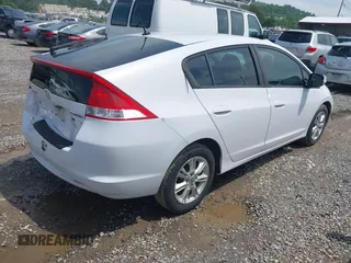 2010 Honda Insight EX z VIN JHMZE2H7XAS009007, wystawiony jako IAAI lot #42480220 z przebiegiem 158 379 mil mil oraz . Historia ofert i sprzedaży dostępna na DreamBid. Obrazek 4.