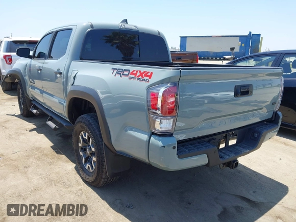 2022 Toyota Tacoma SR with VIN 3TYCZ5AN0NT104300, listed as a IAAI auction lot 42652503 with 18,071 mi miles and . Bid and sale history available at DreamBid. Image 3.