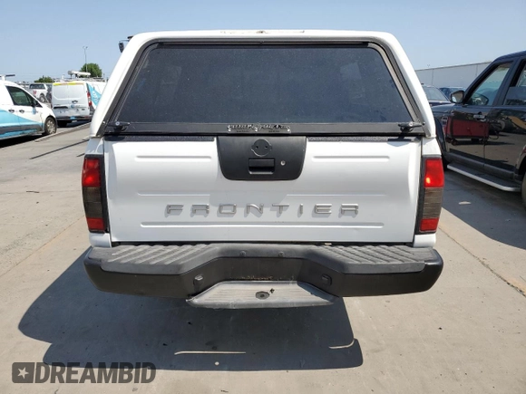 2001 Nissan Frontier XE with VIN 1N6DD26S71C385578, listed as a Copart auction lot 59875405 with 73,936 mi miles and Salvage title. Bid and sale history available at DreamBid. Image 6.