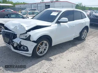 2014 Audi Q5 Premium Plus z VIN WA1CMAFP9EA041976, wystawiony jako IAAI lot #42296067 z przebiegiem 131 906 mil mil oraz . Historia ofert i sprzedaży dostępna na DreamBid. Obrazek 2.