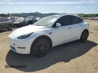 2022 Tesla Model Y Performance z VIN 7SAYGDEF5NF509919, wystawiony jako Copart lot #52137075 z przebiegiem 32 973 mil mil oraz Szkoda całkowita • Salvage title. Historia ofert i sprzedaży dostępna na DreamBid. Obrazek 1.