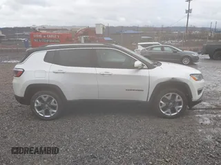 2021 Jeep Compass Limited with VIN 3C4NJCCB9MT597434, listed as a IAAI auction lot 41580549 with 51,549 mi miles. Bid and sale history available at carsss.com. Image 12.