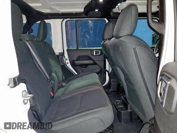 2024 Jeep Wrangler Sahara with VIN 1C4RJXP65RW331514, listed as a Copart auction lot 56888935 with 18,507 mi miles and Clean Title. Bid and sale history available at DreamBid. Image 11.