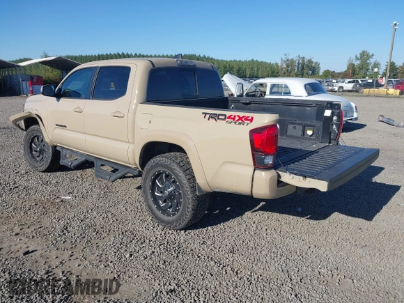 2018 Toyota Tacoma SR z VIN 3TMCZ5AN7JM125425, wystawiony jako IAAI lot #40459066 z przebiegiem 85 182 mil mil oraz . Historia ofert i sprzedaży dostępna na DreamBid. Obrazek 3.