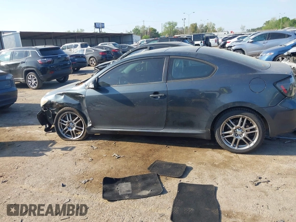 2005 Scion tC with VIN JTKDE177150041877, listed as a IAAI auction lot 41877581 with 240,179 mi miles. Bid and sale history available at carsss.com. Image 14.