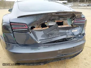 2022 Tesla Model S with VIN 5YJSA1E55NF492601, listed as a IAAI auction lot 41391782 with 27,738 mi miles. Bid and sale history available at carsss.com. Image 6.