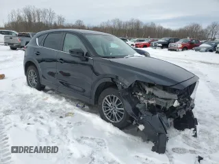 2019 Mazda CX-5 Touring with VIN JM3KFBCM0K0607933, listed as a Copart auction lot 46260815 with 64,349 mi miles and Salvage Title. Bid and sale history available at carsss.com. Image 4.