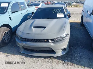 2019 Dodge Charger Scat Pack with VIN 2C3CDXGJ6KH542229, listed as a IAAI auction lot 41989204 with 28,388 mi miles and . Bid and sale history available at DreamBid. Image 13.