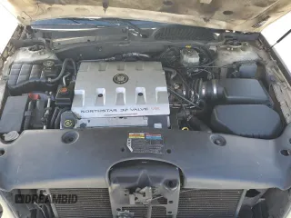2001 Cadillac DeVille z VIN 1G6KD54Y61U227040, wystawiony jako Copart lot #46423295 z przebiegiem 180 289 mil mil oraz Szkoda całkowita • Salvage title. Historia ofert i sprzedaży dostępna na DreamBid. Obrazek 13.