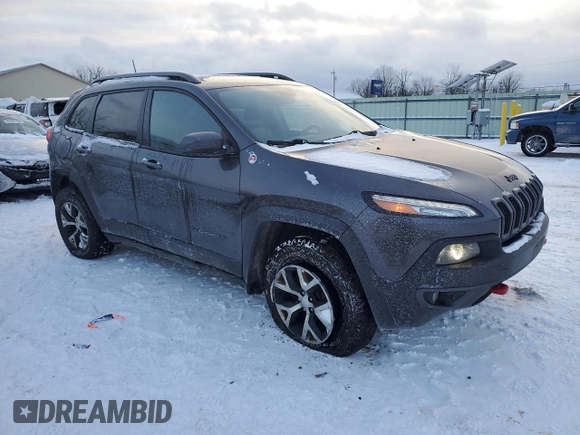 2017 Jeep Cherokee Trailhawk L Plus with VIN 1C4PJMBS2HD228037, listed as a Copart auction lot 41365075 with 84,479 mi miles and Salvage Title. Bid and sale history available at carsss.com. Image 4.