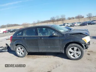 2010 Dodge Caliber SXT with VIN 1B3CB4HA4AD651946, listed as a IAAI auction lot 41771139 with 165,663 mi miles and . Bid and sale history available at DreamBid. Image 14.