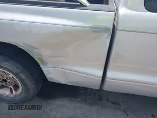 1999 Dodge Dakota SLT z VIN 1B7GL22X9XS258964, wystawiony jako IAAI lot #42309862 z przebiegiem 177 561 mil mil oraz . Historia ofert i sprzedaży dostępna na DreamBid. Obrazek 17.
