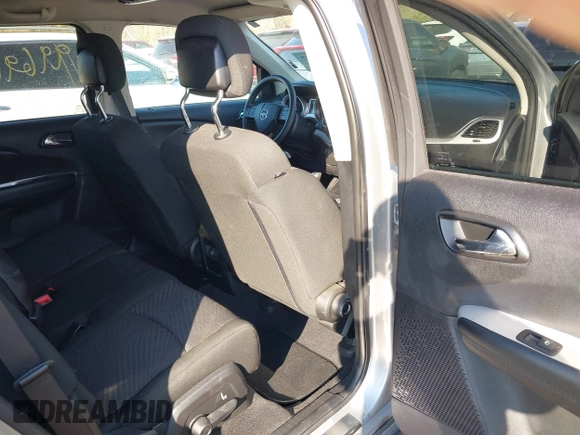 2019 Dodge Journey SE with VIN 3C4PDCBB6KT835643, listed as a IAAI auction lot 40702227 with 99,691 mi miles and . Bid and sale history available at DreamBid. Image 8.