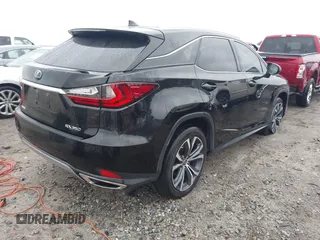 2021 Lexus RX with VIN 2T2HZMAA0MC201749, listed as a IAAI auction lot 41426758 with 148,064 mi miles. Bid and sale history available at carsss.com. Image 4.