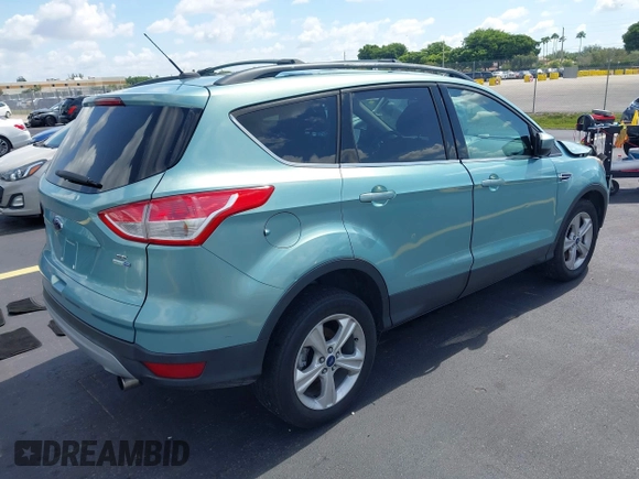 2013 Ford Escape SE with VIN 1FMCU9GX0DUC75662, listed as a IAAI auction lot 42549360 with 156,666 mi miles and . Bid and sale history available at DreamBid. Image 4.