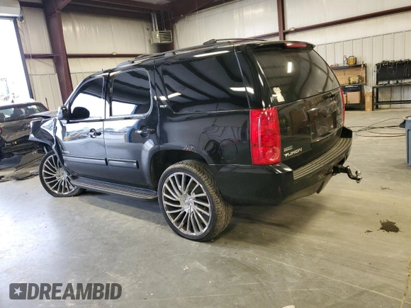 2011 GMC Yukon SLT with VIN 1GKS2CE05BR139136, listed as a Copart auction lot 89395985 with 245,690 mi miles and Salvage Title. Bid and sale history available at carsss.com. Image 2.