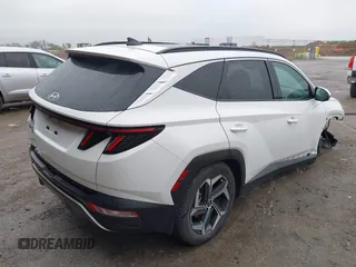 2023 Hyundai Tucson Limited with VIN 5NMJE3AEXPH236828, listed as a IAAI auction lot 41963894 with 66,065 mi miles and . Bid and sale history available at DreamBid. Image 4.