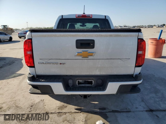 2019 Chevrolet Colorado 2WD Work Truck z VIN 1GCGSBEN2K1218432, wystawiony jako Copart lot #52178825 z przebiegiem 123 016 mil mil oraz Szkoda całkowita • Salvage title. Historia ofert i sprzedaży dostępna na DreamBid. Obrazek 6.