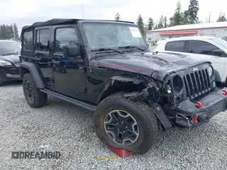 2015 Jeep Wrangler Unlimited Rubicon Hard Rock with VIN 1C4HJWFG6FL757421, listed as a IAAI auction lot 42107514 with 63,997 mi miles and . Bid and sale history available at DreamBid. Image 1.