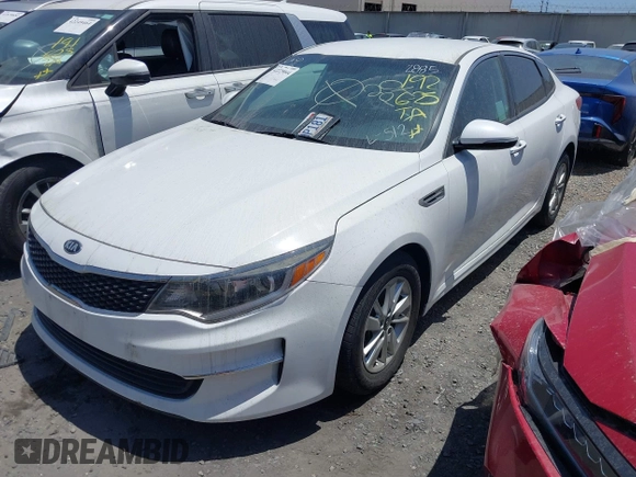 2016 Kia Optima LX z VIN KNAGT4L38G5102885, wystawiony jako IAAI lot #42229044 z przebiegiem 102 416 mil mil oraz . Historia ofert i sprzedaży dostępna na DreamBid. Obrazek 2.