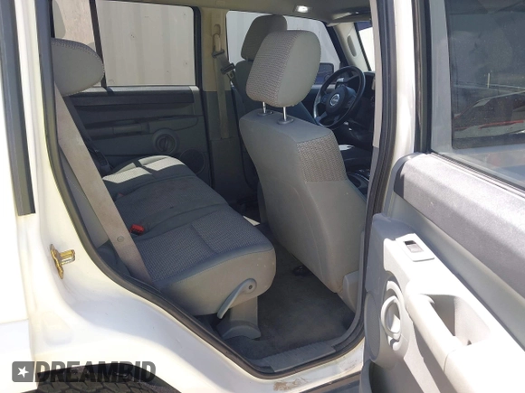2007 Jeep Commander Sport with VIN 1J8HG48P97C601058, listed as a IAAI auction lot 42489447 with 200,103 mi miles and . Bid and sale history available at DreamBid. Image 8.