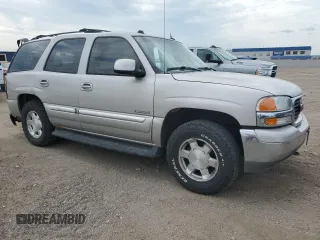 2004 GMC Yukon SLT with VIN 1GKEK13Z74J295635, listed as a Copart auction lot 70412114 with 262,062 mi miles and Salvage Title. Bid and sale history available at carsss.com. Image 4.