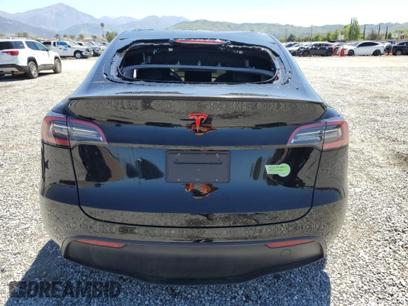 2022 Tesla Model Y Performance z VIN 7SAYGDEF0NF540933, wystawiony jako Copart lot #56087145 z przebiegiem 59 717 mil mil oraz Szkoda całkowita • Salvage title. Historia ofert i sprzedaży dostępna na DreamBid. Obrazek 6.