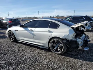 2017 BMW M6 z VIN WBS6E9C56HG437410, wystawiony jako Copart lot #80217694 z przebiegiem 68 335 mil mil oraz Szkoda całkowita • Salvage title. Historia ofert i sprzedaży dostępna na DreamBid. Obrazek 2.