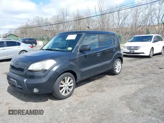 2010 Kia Soul + with VIN KNDJT2A29A7038620, listed as a IAAI auction lot 41989573 with 141,312 mi miles. Bid and sale history available at carsss.com. Image 2.