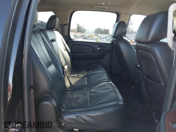2014 Chevrolet Suburban LT with VIN 1GNSCJE08ER240230, listed as a IAAI auction lot 41702593 with 140,190 mi miles. Bid and sale history available at carsss.com. Image 8.