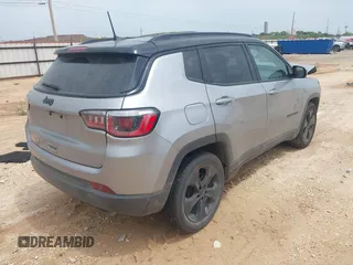 2018 Jeep Compass Latitude with VIN 3C4NJCBBXJT494116, listed as a IAAI auction lot 42150992 with 96,125 mi miles and . Bid and sale history available at DreamBid. Image 4.
