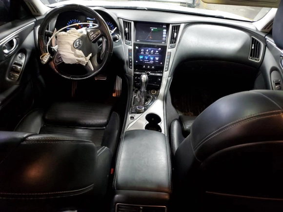 2015 Infiniti Q50 Premium with VIN JN1BV7AR7FM396562, listed as a Copart auction lot 52698765 with 103,824 mi miles and Salvage Title. Bid and sale history available at carsss.com. Image 8.