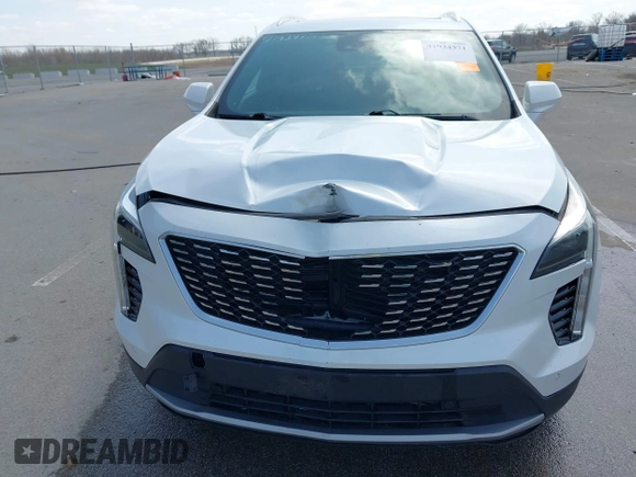 2020 Cadillac XT4 AWD Premium Luxury z VIN 1GYFZDR44LF036461, wystawiony jako IAAI lot #41934371 z przebiegiem 90 545 mil mil oraz . Historia ofert i sprzedaży dostępna na DreamBid. Obrazek 6.