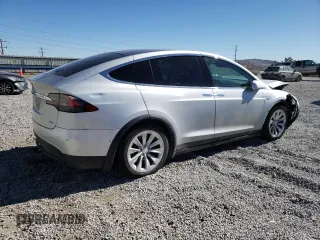 2016 Tesla Model X 70D with VIN 5YJXCAE29GF004033, listed as a Copart auction lot 49673975 with 220,259 mi miles and Salvage Title. Bid and sale history available at DreamBid. Image 3.