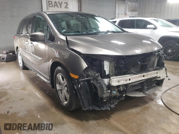2019 Honda Odyssey EX-L with VIN 5FNRL6H76KB081335, listed as a Copart auction lot 51173805 with 60,498 mi miles and Salvage Title. Bid and sale history available at carsss.com. Image 4.