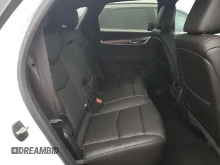 2022 Cadillac XT5 FWD Luxury z VIN 1GYKNAR48NZ163921, wystawiony jako Copart lot #74507874 z przebiegiem 5 723 mil mil oraz Nie do naprawy • Non repairable. Historia ofert i sprzedaży dostępna na DreamBid. Obrazek 11.