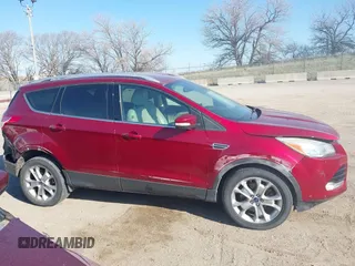 2014 Ford Escape Titanium with VIN 1FMCU9J98EUC24857, listed as a IAAI auction lot 41973037 with 160,634 mi miles. Bid and sale history available at carsss.com. Image 14.