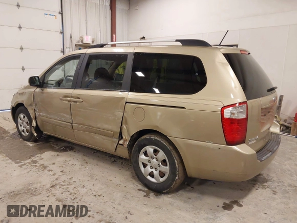 2009 Kia Sedona LX with VIN KNDMB233996314804, listed as a IAAI auction lot 42014187 with 220,693 mi miles and . Bid and sale history available at DreamBid. Image 3.