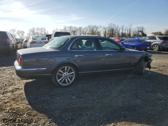 2004 Jaguar XJ with VIN SAJWA73B64TG28182, listed as a Copart auction lot 78380674 with 0 miles and Salvage Title. Bid and sale history available at carsss.com. Image 3.